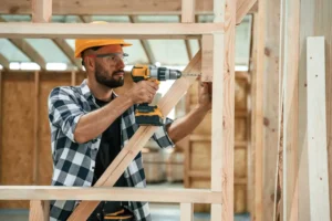 drilling-the-hole-in-the-wood-industrial-worker-i-2026-01-09-00-00-23-utc.webp